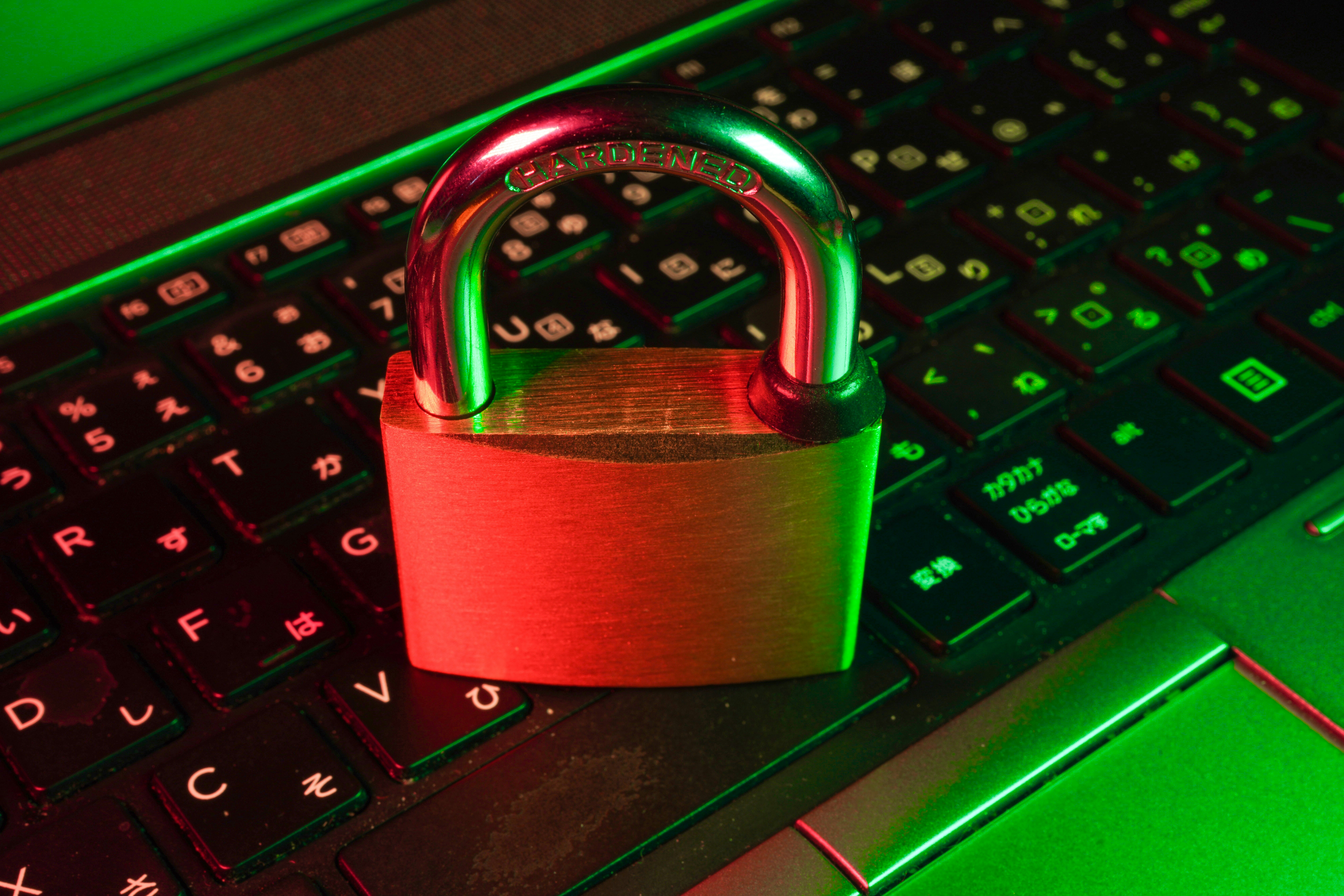 Compliance officers integrating cybersecurity into corporate governance to manage organizational risk.