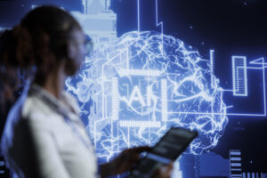 Professional woman viewing screen with AI interface representing agentic AI in RegTech for compliance and risk detection
